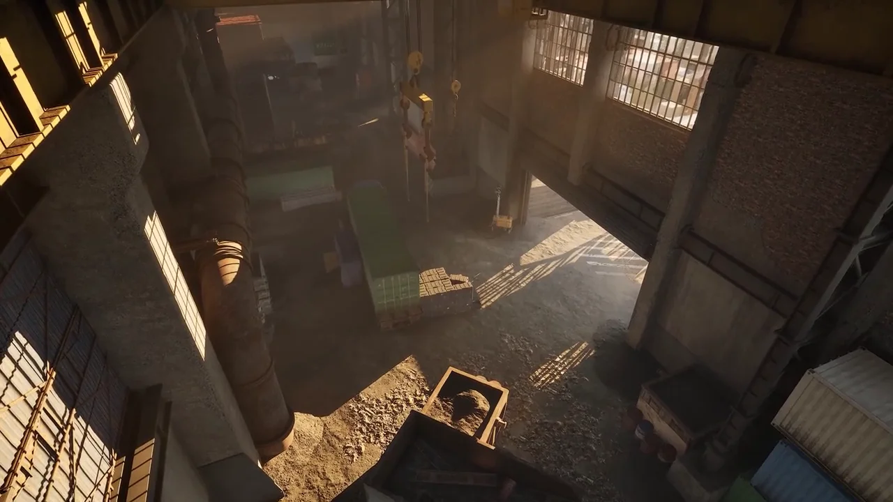 An overhead view inside a WARDOGS industrial building in the official reveal trailer.