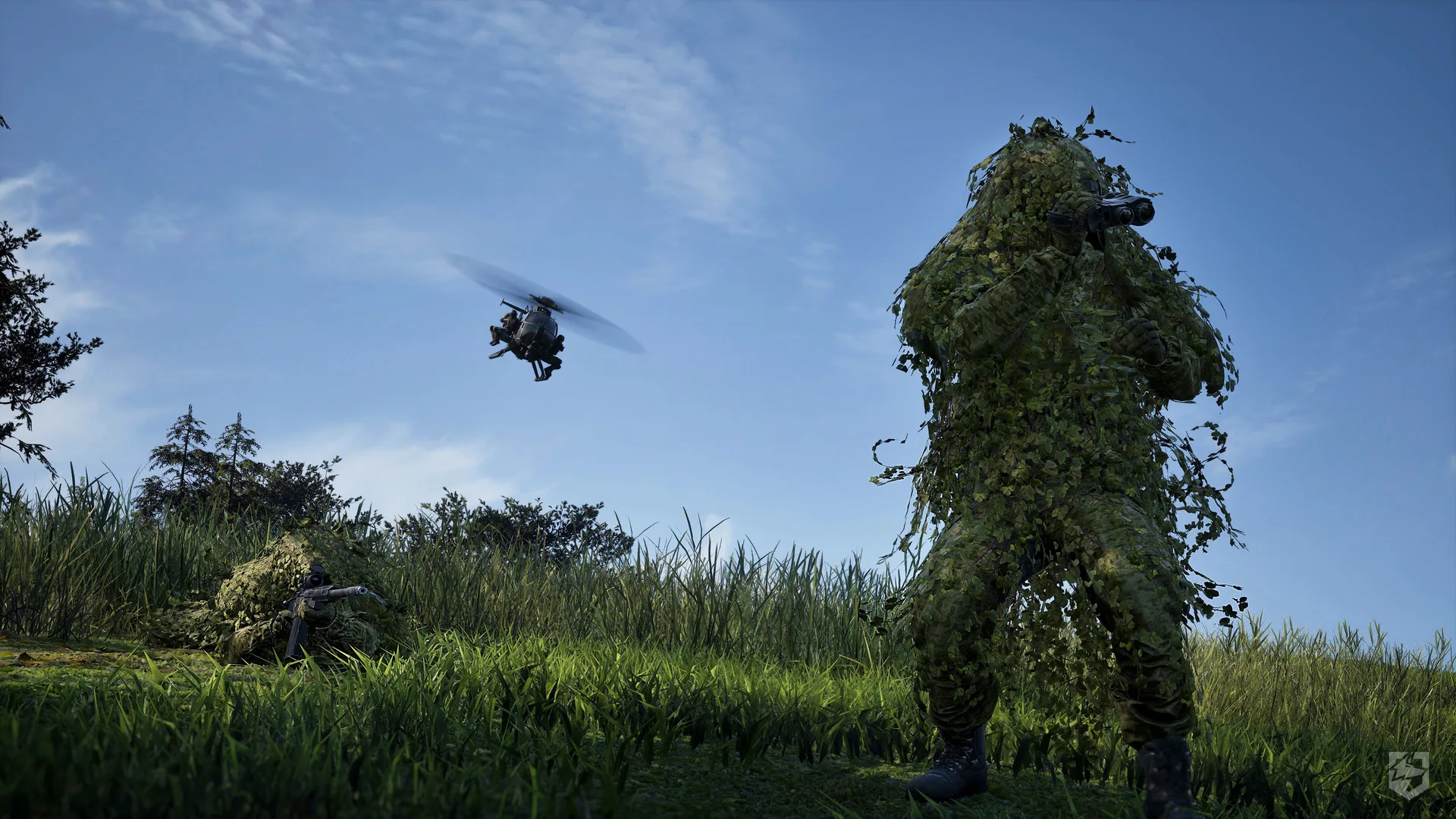 A soldier in a ghillie suit watches a passing helicopter in WARDOGS.