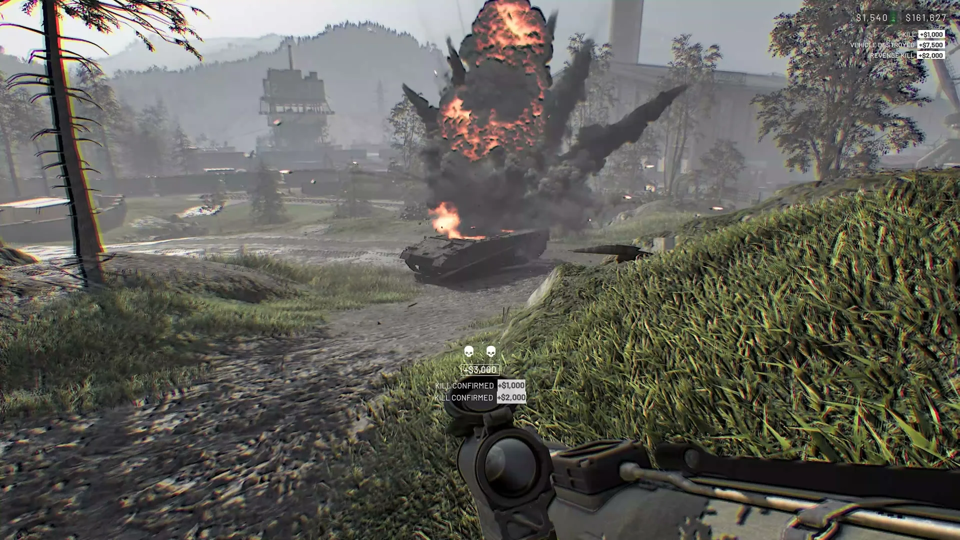 A burning vehicle beside houses in the WARDOGS reveal trailer.