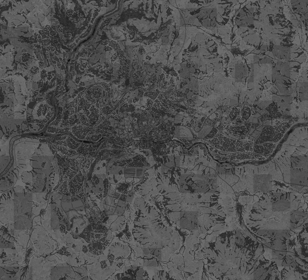 Ozeti's overhead map with a central settlement, a sports field to the south and roads through surrounding hills.