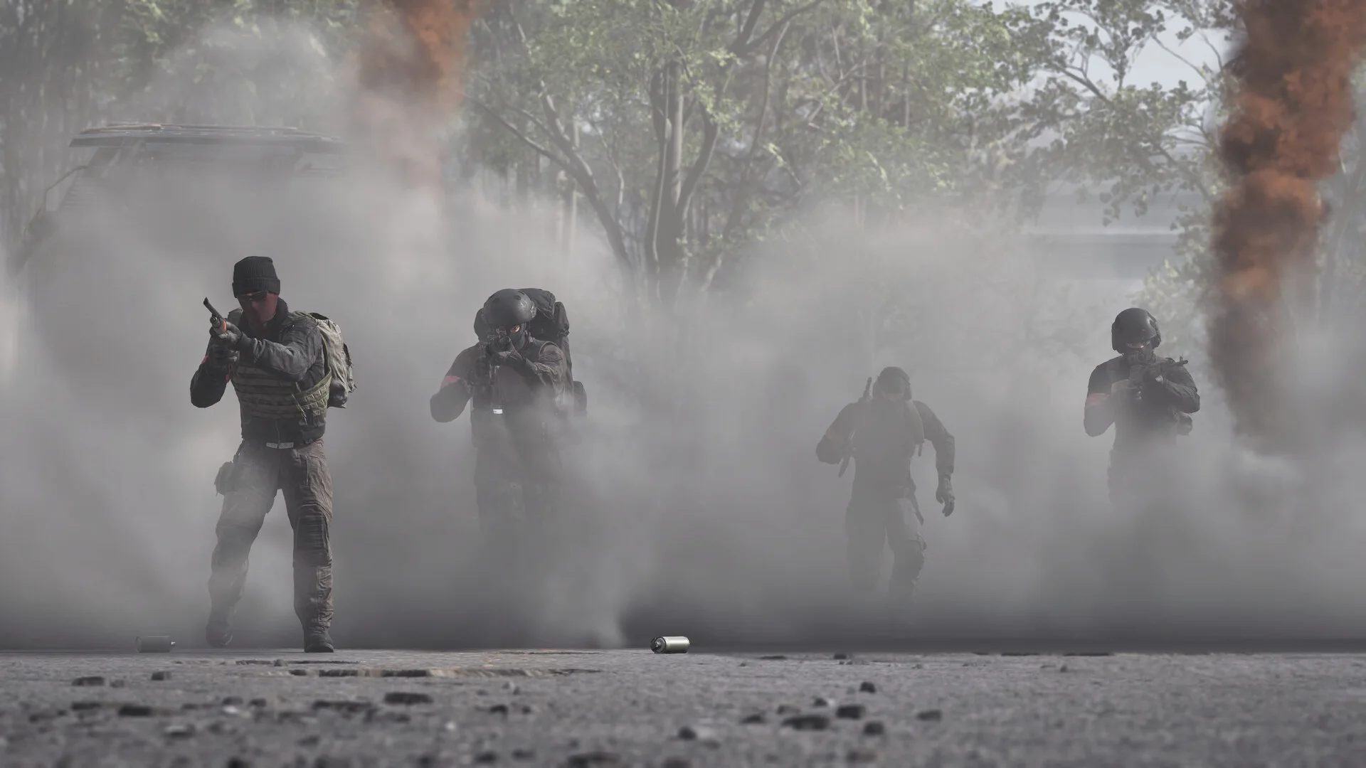 Infantry move through a cloud of smoke on a WARDOGS battlefield.