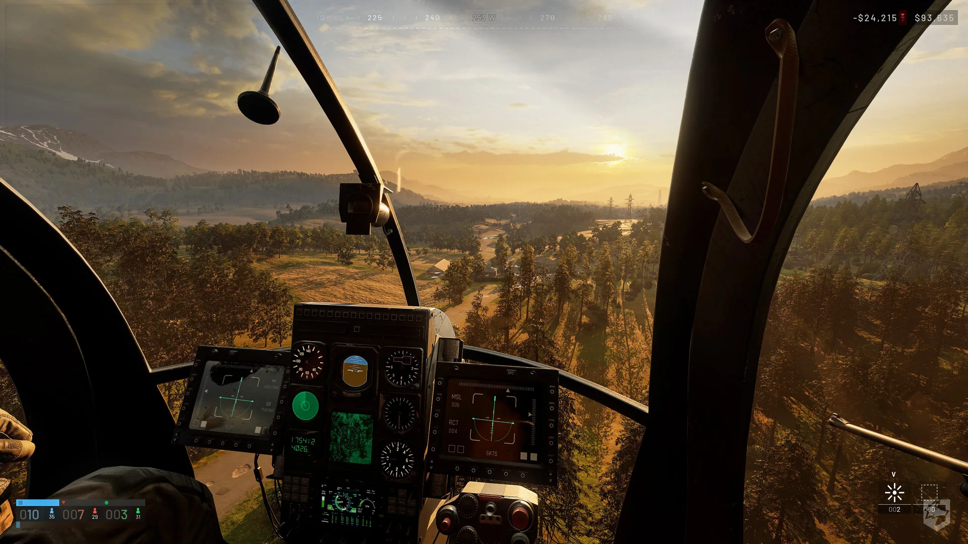 The helicopter cockpit and flight instruments above a wooded valley in WARDOGS.